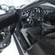 Even the interior is an accurate homage—door pockets big enough for a racing helmet. Image courtesy of Road & Track/Máté Petrány.